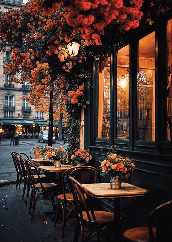 Classic Parisian cafe with orange flowers in autumn light-12