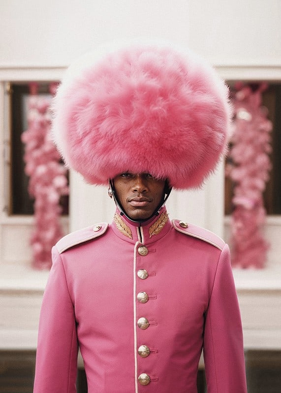 Royal guard in pink uniform and large plume, photographic-12