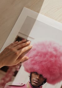 Royal guard in pink uniform and large plume, photographic-9