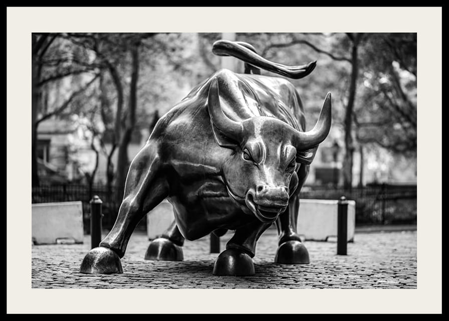 Black and white photo of the Charging Bull sculpture in New York-12