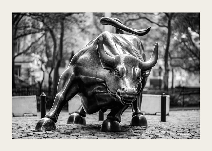 Black and white photo of the Charging Bull sculpture in New York-12