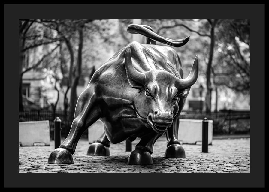 Black and white photo of the Charging Bull sculpture in New York-12