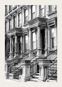 Black and white close-up of classic townhouse facades in New York-3