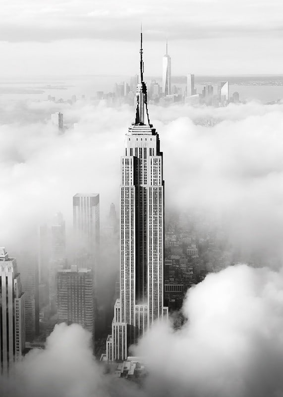 Empire State Building in black and white among clouds over Manhattan-12