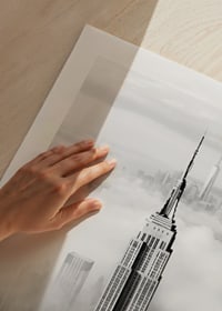 Empire State Building in black and white among clouds over Manhattan-9