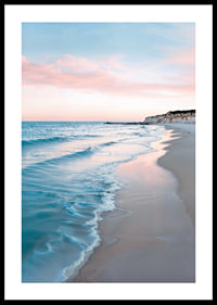 Fotografi av strand med blått hav och rosa kvällshimmel-0