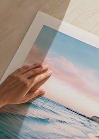 Fotografi av strand med blått hav och rosa kvällshimmel-9