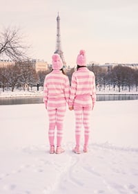 Two people in pink striped pajamas, winter at the Eiffel Tower-7