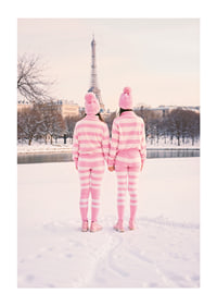 Two people in pink striped pajamas, winter at the Eiffel Tower-1