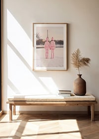 Two people in pink striped pajamas, winter at the Eiffel Tower-8