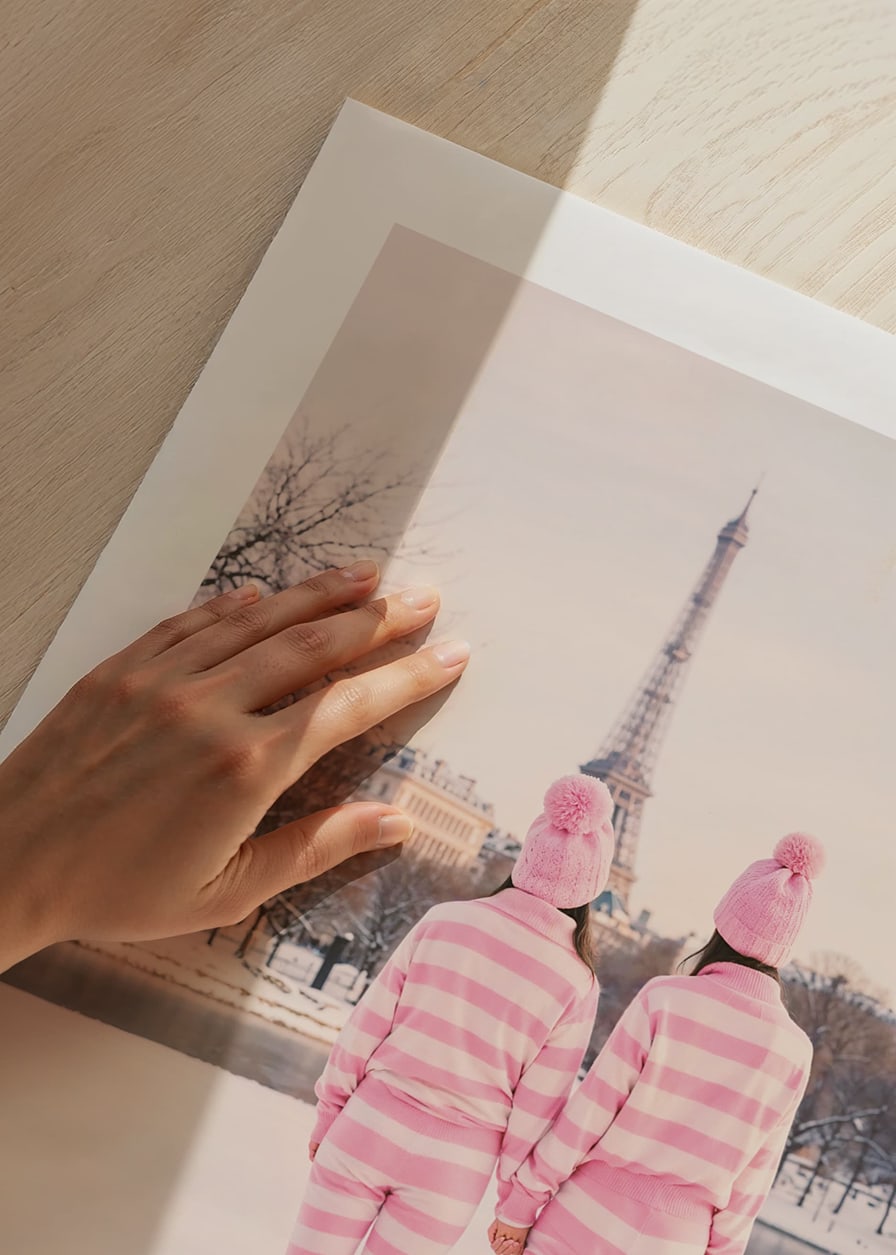 Two people in pink striped pajamas, winter at the Eiffel Tower-12
