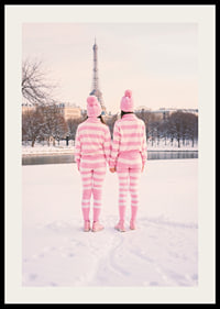 Two people in pink striped pajamas, winter at the Eiffel Tower-2