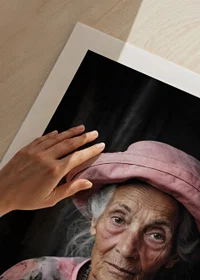 Portrait of elderly woman with pink hat and floral shirt-9