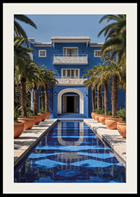 Photograph of blue villa with palm trees and long swimming pool in the foreground-2