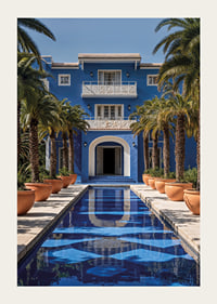 Photograph of blue villa with palm trees and long swimming pool in the foreground-3