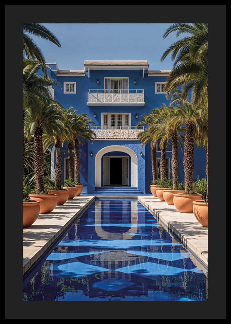 Photograph of blue villa with palm trees and long swimming pool in the foreground-12