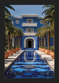 Photograph of blue villa with palm trees and long swimming pool in the foreground-5