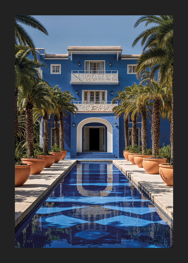 Photograph of blue villa with palm trees and long swimming pool in the foreground-12