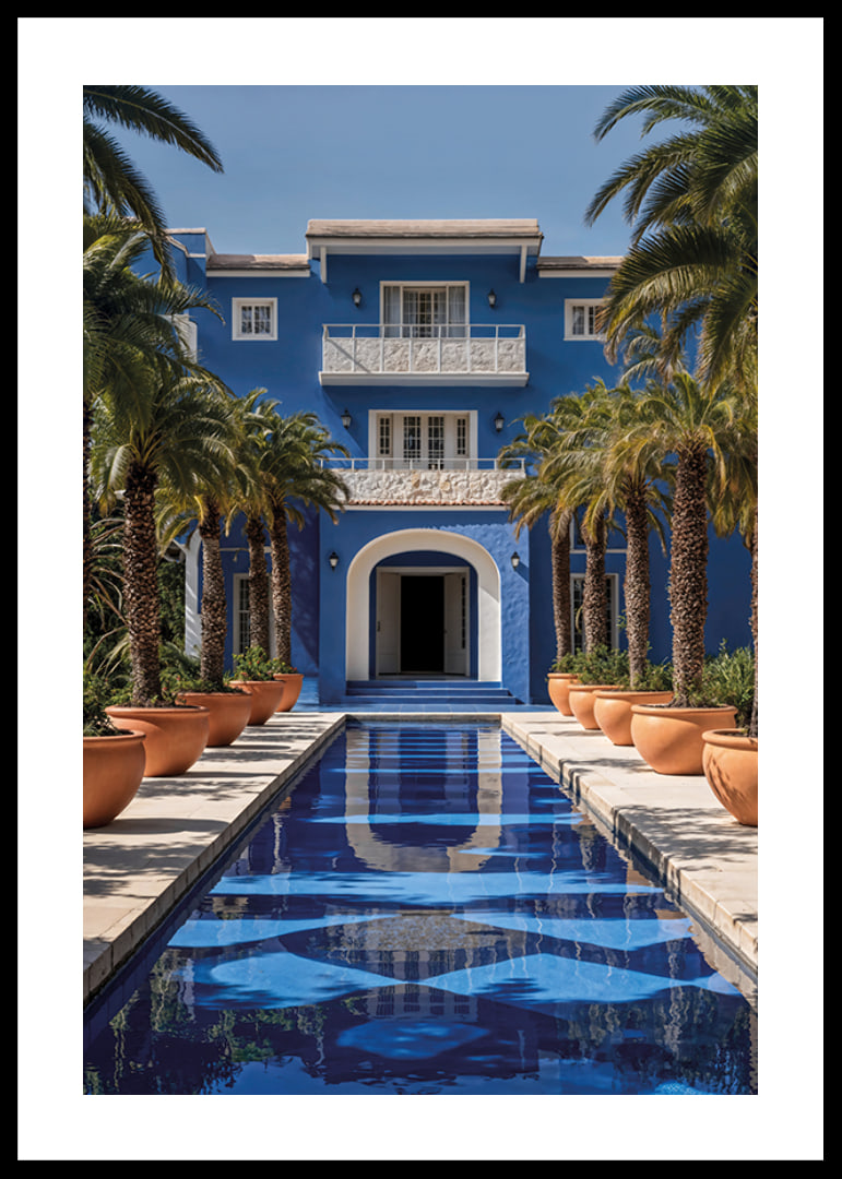 Photograph of blue villa with palm trees and long swimming pool in the foreground-12