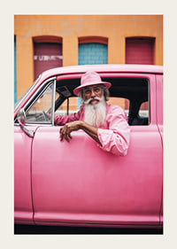 Elderly man with long beard in pink car in front of colorful facade-3