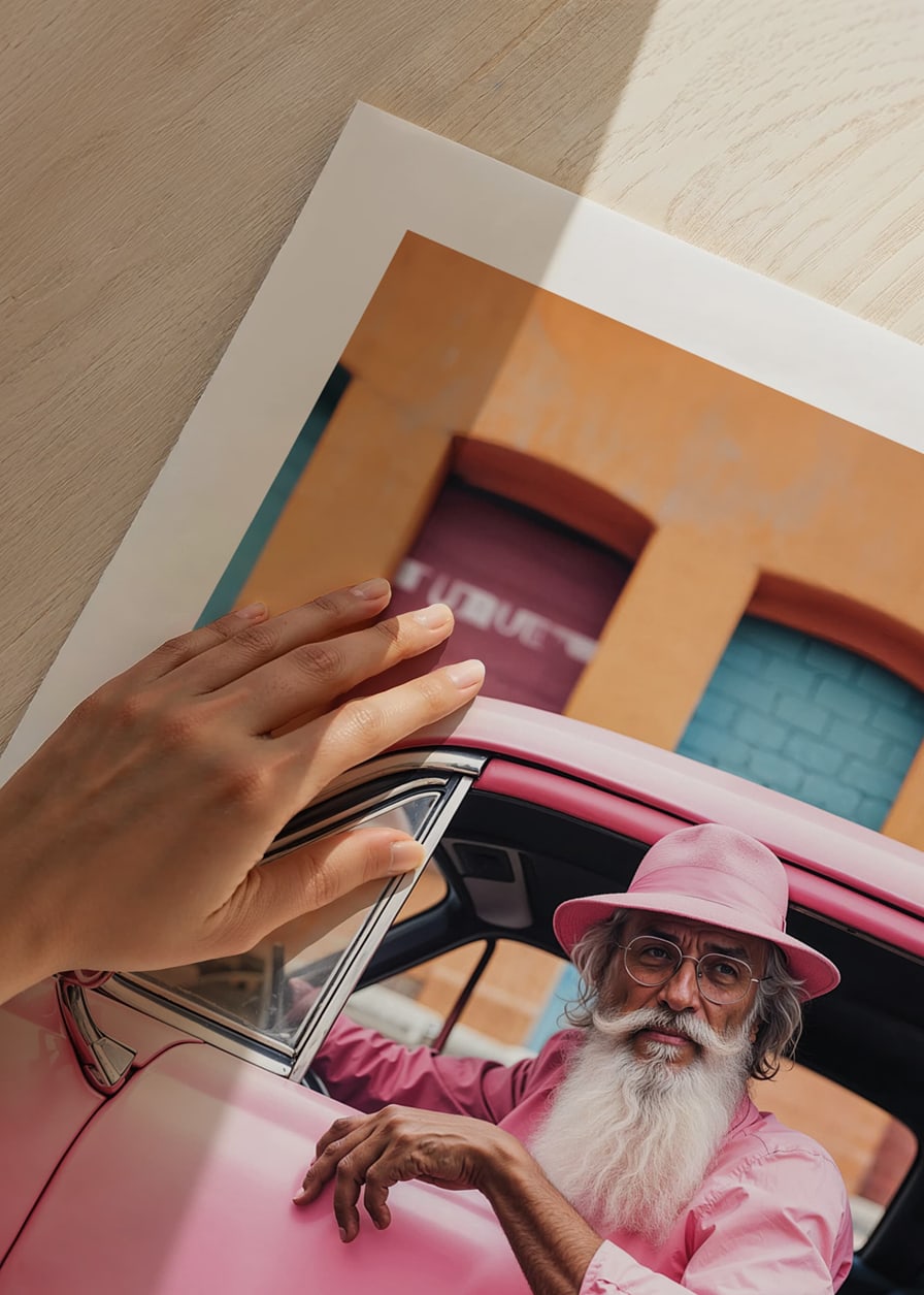 Elderly man with long beard in pink car in front of colorful facade-12
