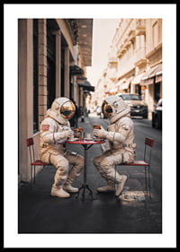 Two astronauts in white suits having coffee at a table outdoors-0
