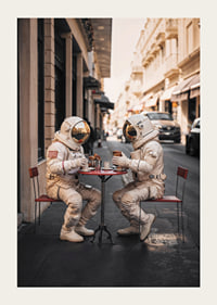 Two astronauts in white suits having coffee at a table outdoors-3