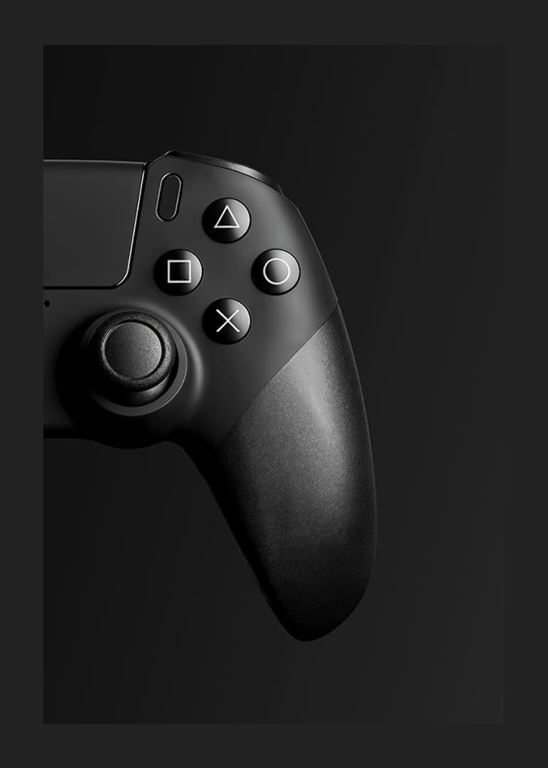 Close-up of black game controller with matte black background-12