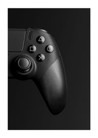 Close-up of black game controller with matte black background-3