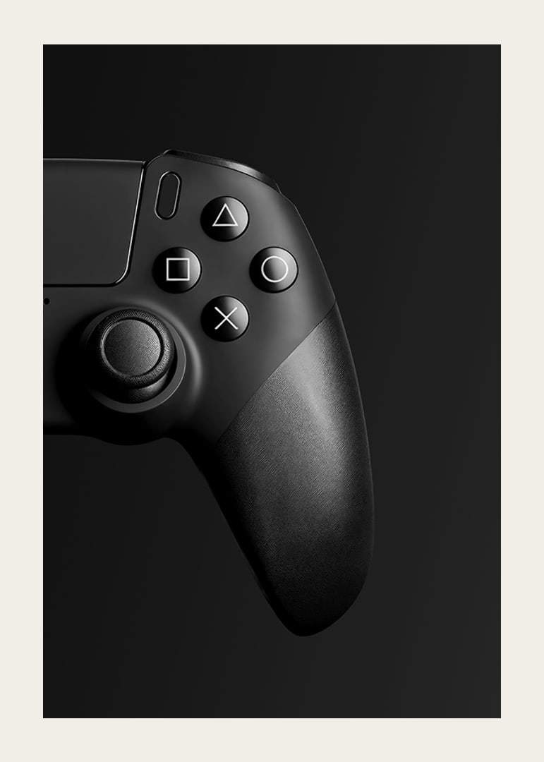 Close-up of black game controller with matte black background-12