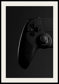 Gros plan noir et blanc d'une manette de jeu avec un ombrage doux-2