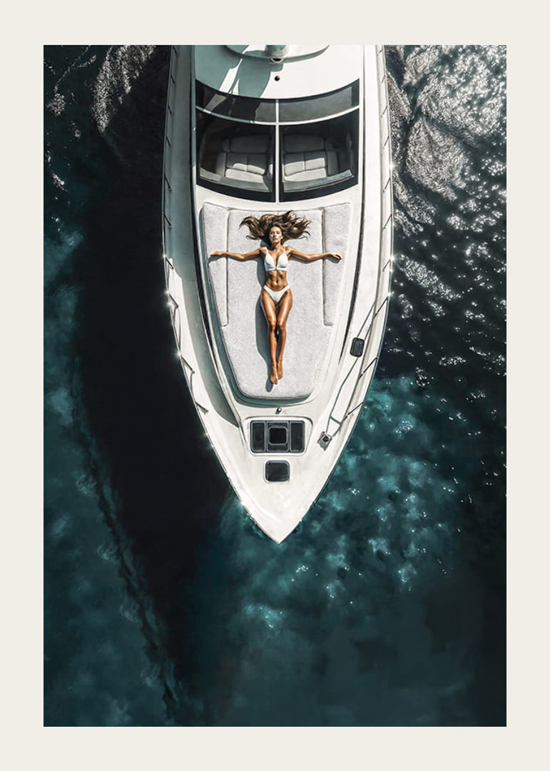 Aerial view of woman in white swimsuit on luxury yacht over turquoise sea-12
