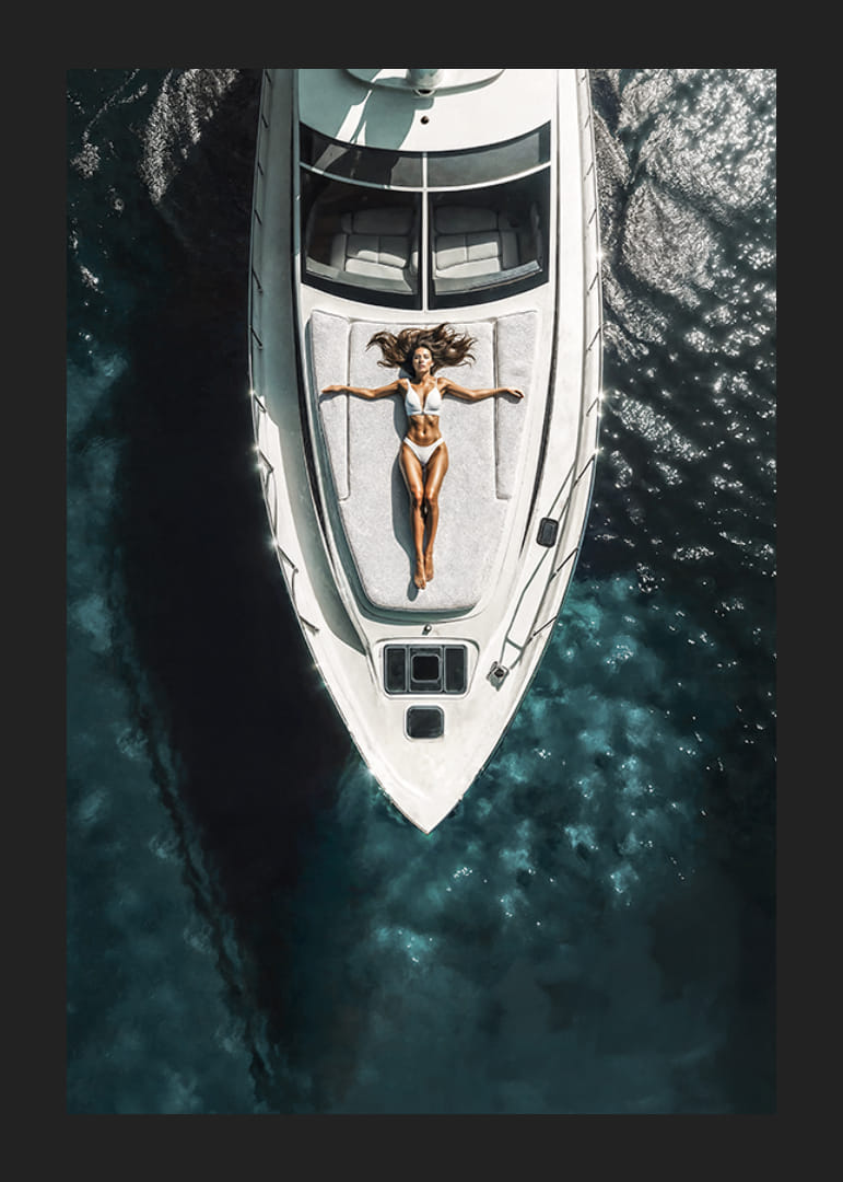 Aerial view of woman in white swimsuit on luxury yacht over turquoise sea-12