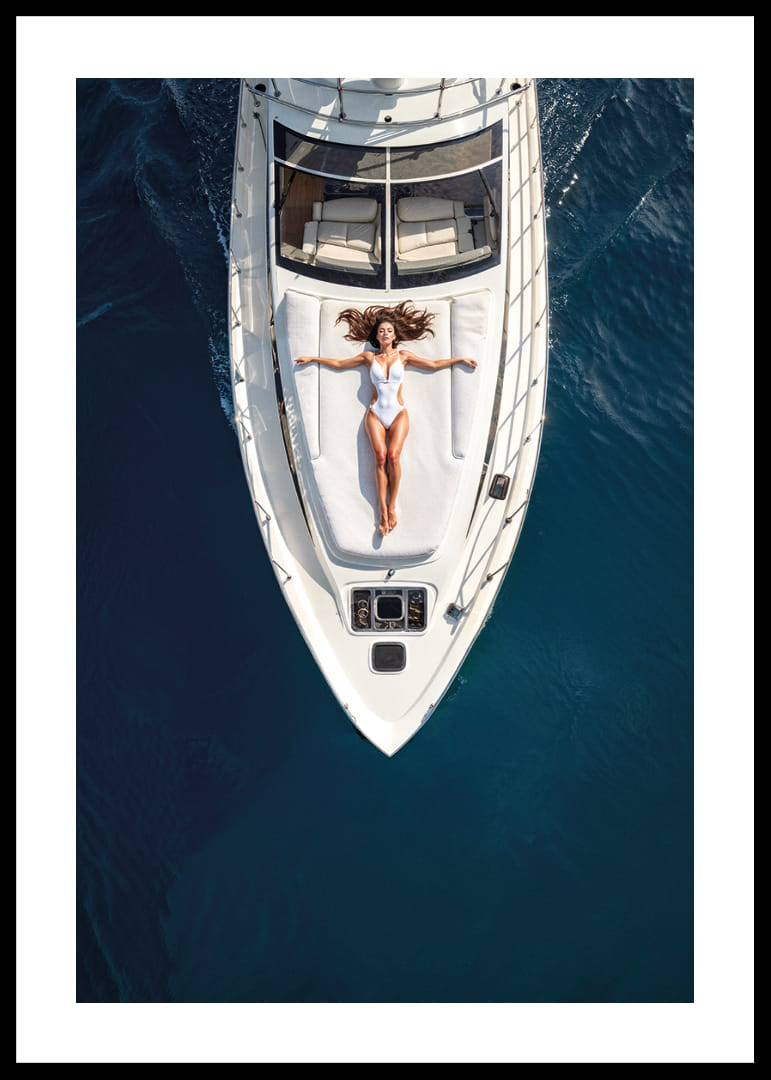 Aerial view of woman in white swimsuit on luxury yacht over turquoise sea-12