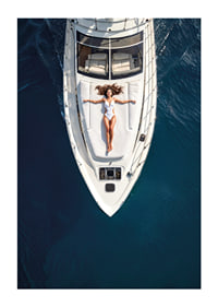 Aerial view of woman in white swimsuit on luxury yacht over turquoise sea-1