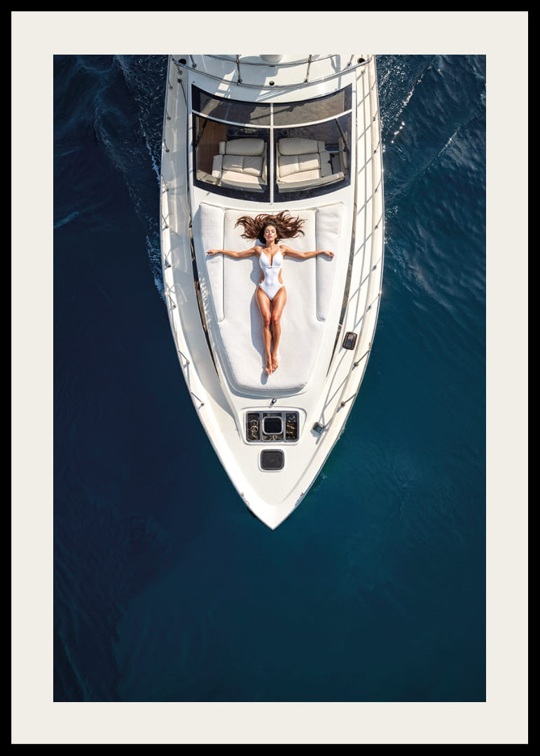Aerial view of woman in white swimsuit on luxury yacht over turquoise sea-12