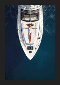 Aerial view of woman in white swimsuit on luxury yacht over turquoise sea-5