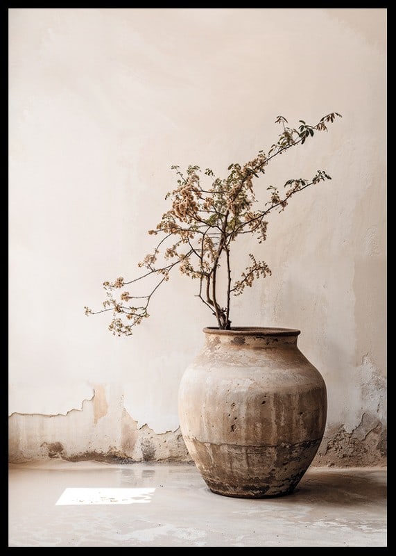Photograph of rustic clay pot with flowering twig in soft beige tones-12
