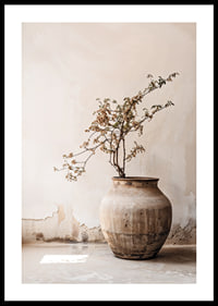 Photograph of rustic clay pot with flowering twig in soft beige tones-0