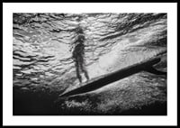 Black and white poster with a photograph of an underwater view with a silhouette of a surfer-0