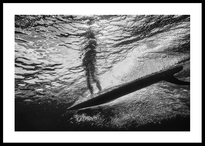 Black and white poster with a photograph of an underwater view with a silhouette of a surfer-12