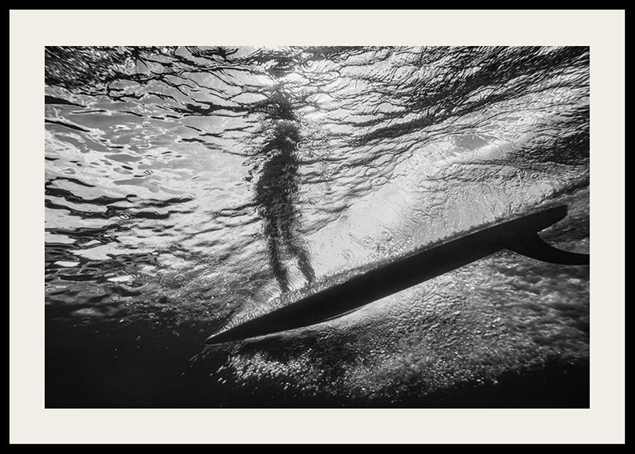 Black and white poster with a photograph of an underwater view with a silhouette of a surfer-12