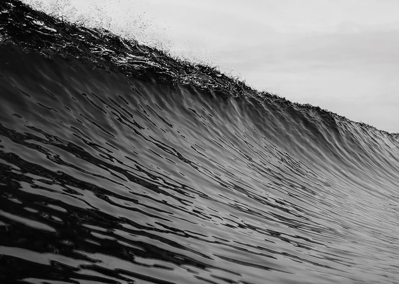 Black and white poster capturing a snapshot of a mighty wave-12