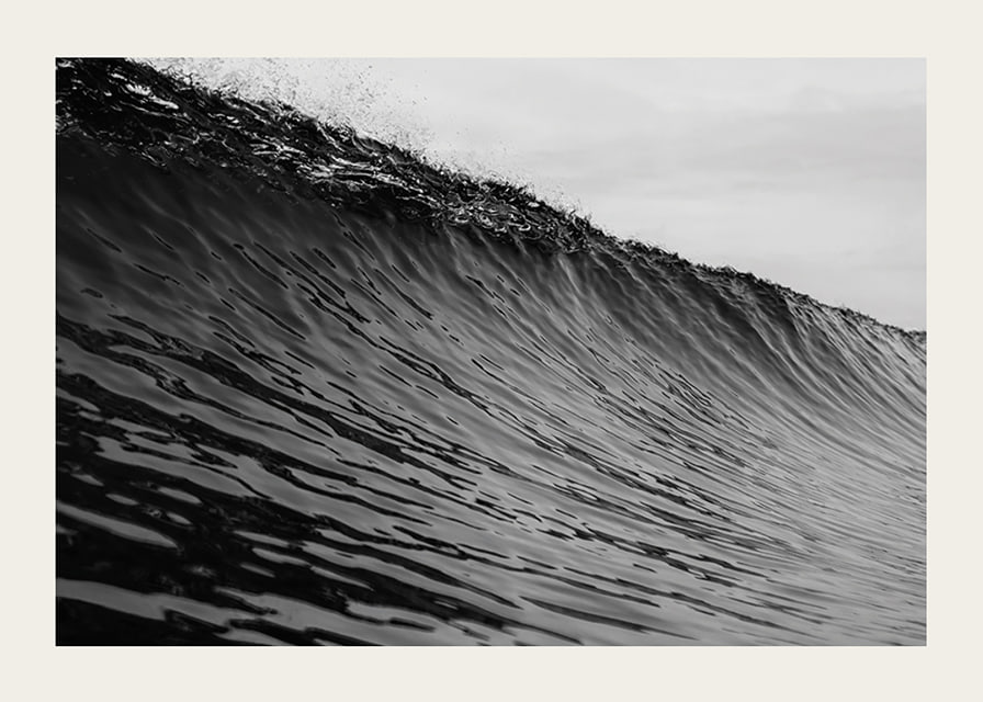 Black and white poster capturing a snapshot of a mighty wave-12
