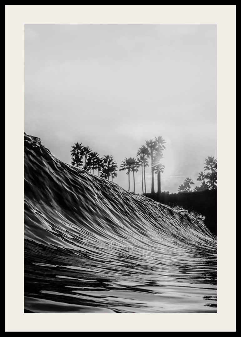 Black and white poster with a photograph that captures a dramatic view of a crashing wave-12