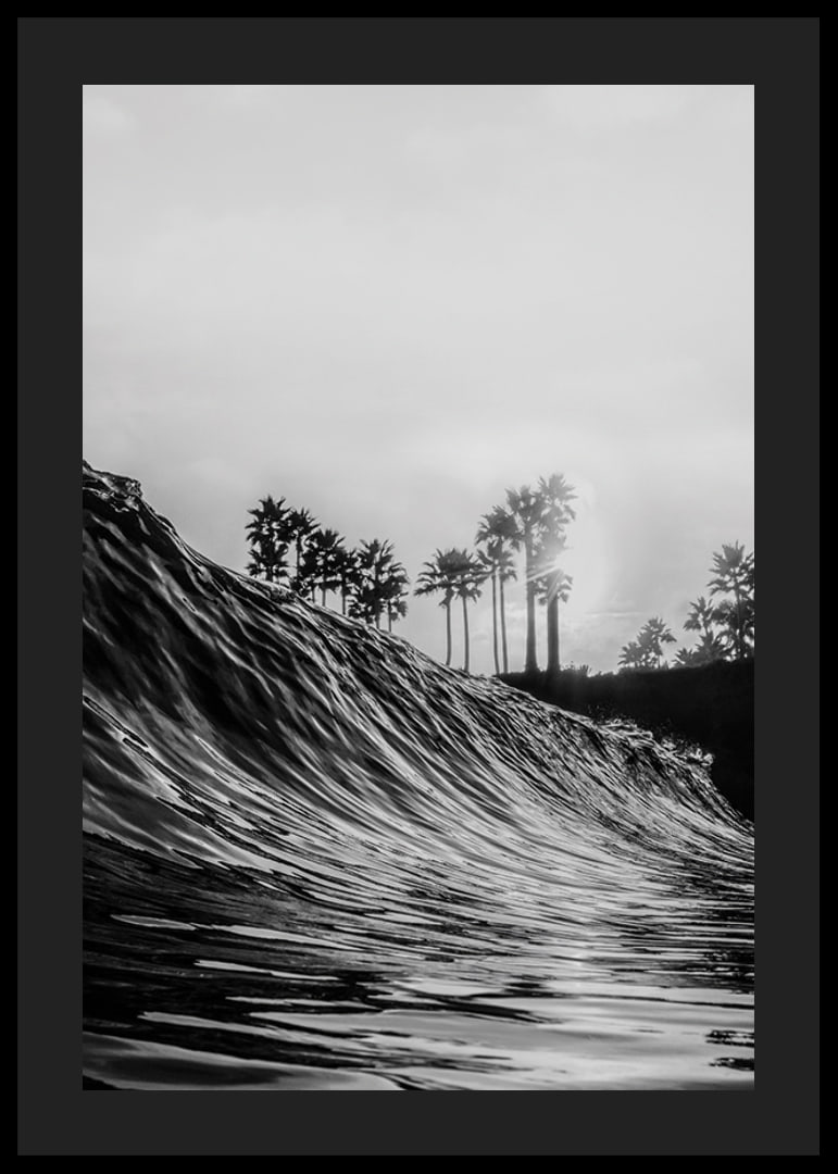 Black and white poster with a photograph that captures a dramatic view of a crashing wave-12