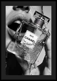 Black and white poster with a sensual photograph of a woman holding a Chanel No5 perfume bottle-4