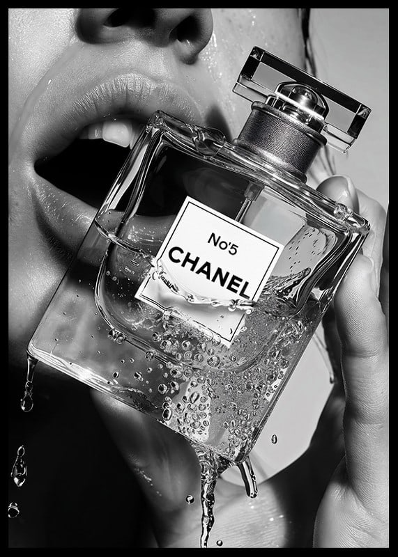 Black and white poster with a sensual photograph of a woman holding a Chanel No5 perfume bottle-12
