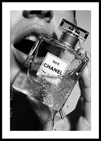 Black and white poster with a sensual photograph of a woman holding a Chanel No5 perfume bottle-0