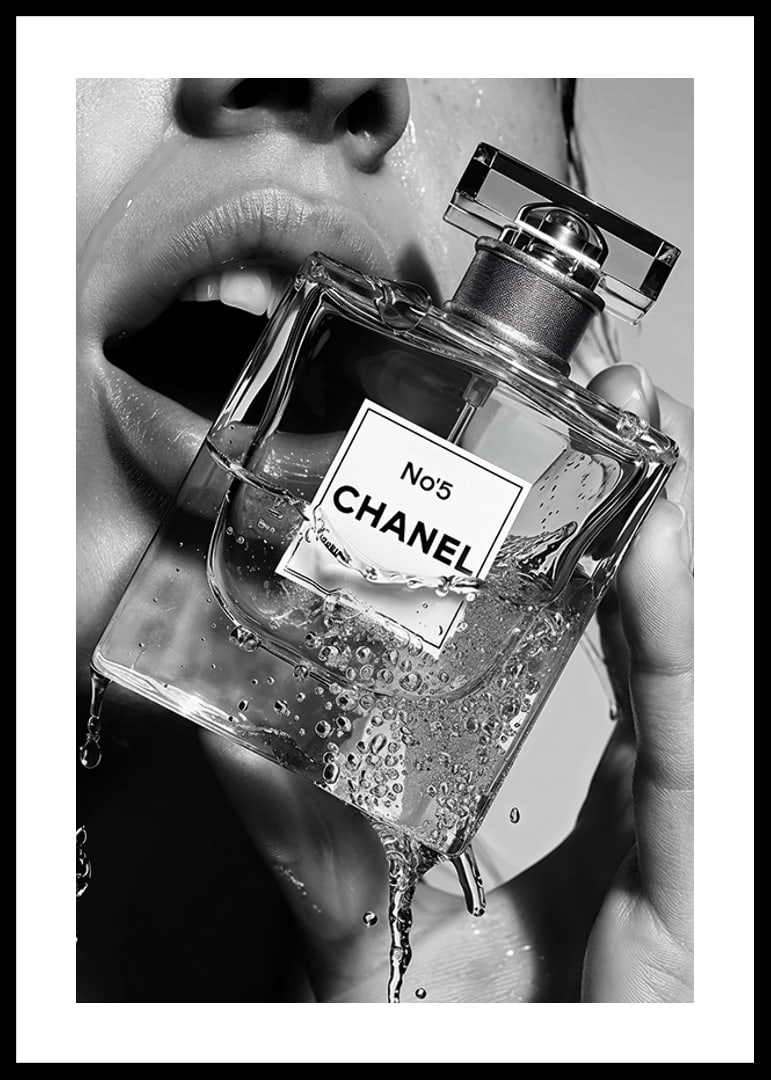 Black and white poster with a sensual photograph of a woman holding a Chanel No5 perfume bottle-12